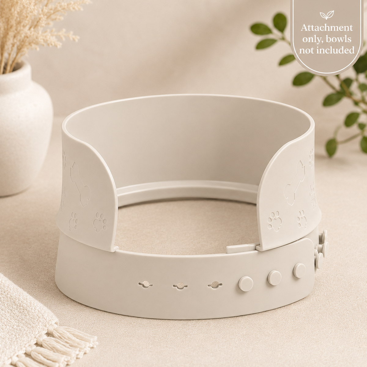 MessMate cream silicone pet bowl splash guard with raised walls and adjustable fastening strap