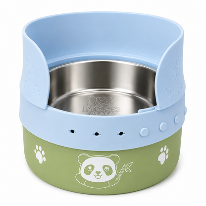A pet feeding bowl with a light blue splash guard to attach to bowls by MessMate and a green base featuring a white panda illustration and paw prints, containing a stainless steel bowl, on a white background.